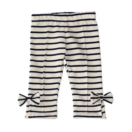 3/4 lange leggings med åbning nederst på benene dekoreret med sløjfer.